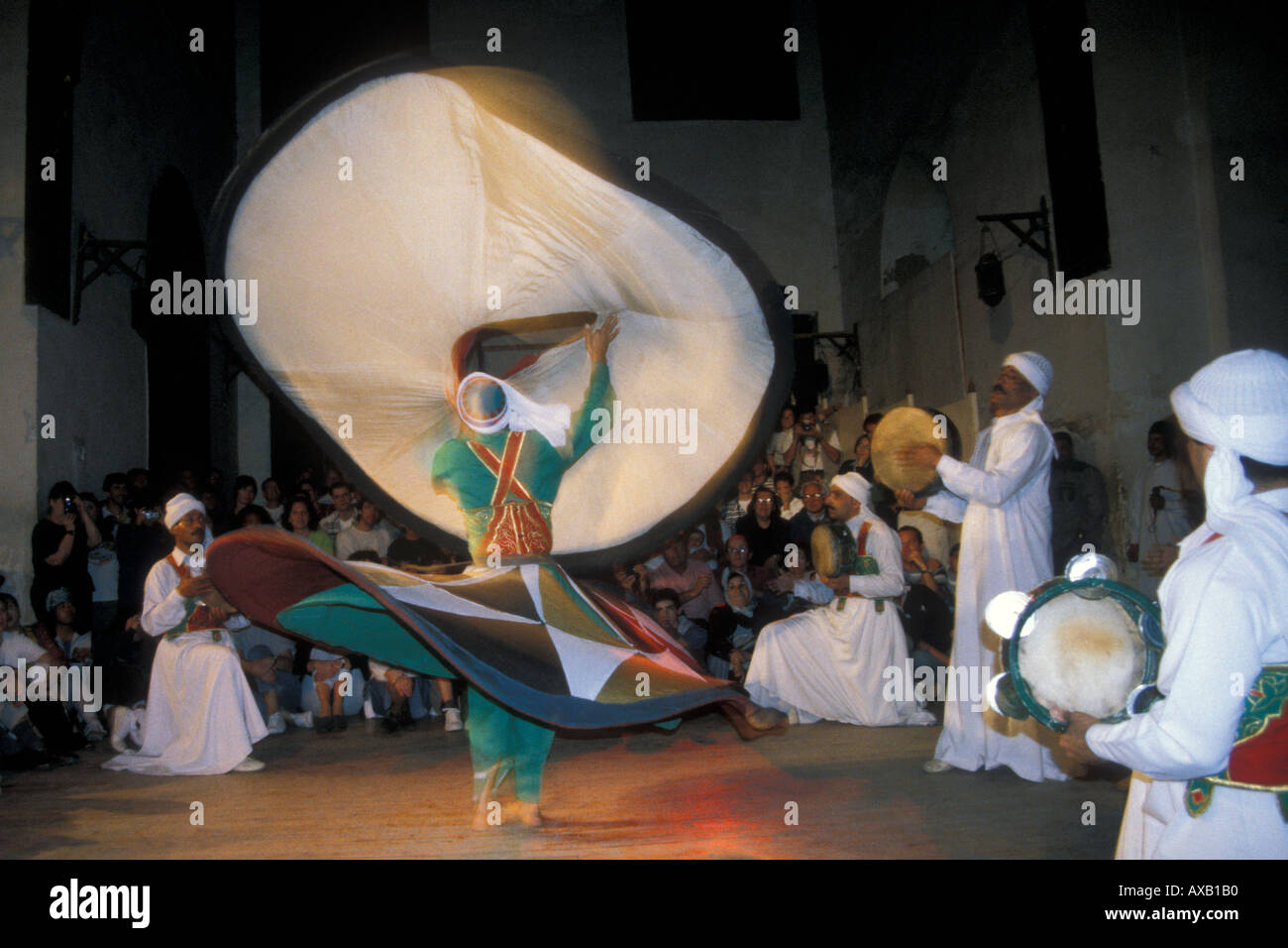 The Al Tannoura Egyptian Heritage Dance Troupe performing traditional Sufi dance Stock Photo