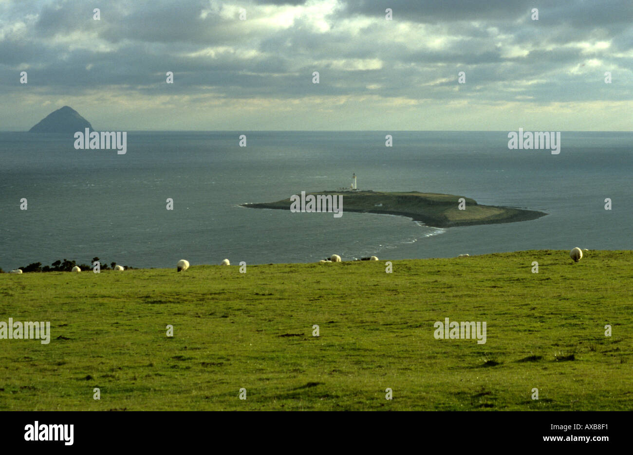 Pladda Island lighthouse from the Isle of Arran Ailsa Craig Stock Photo