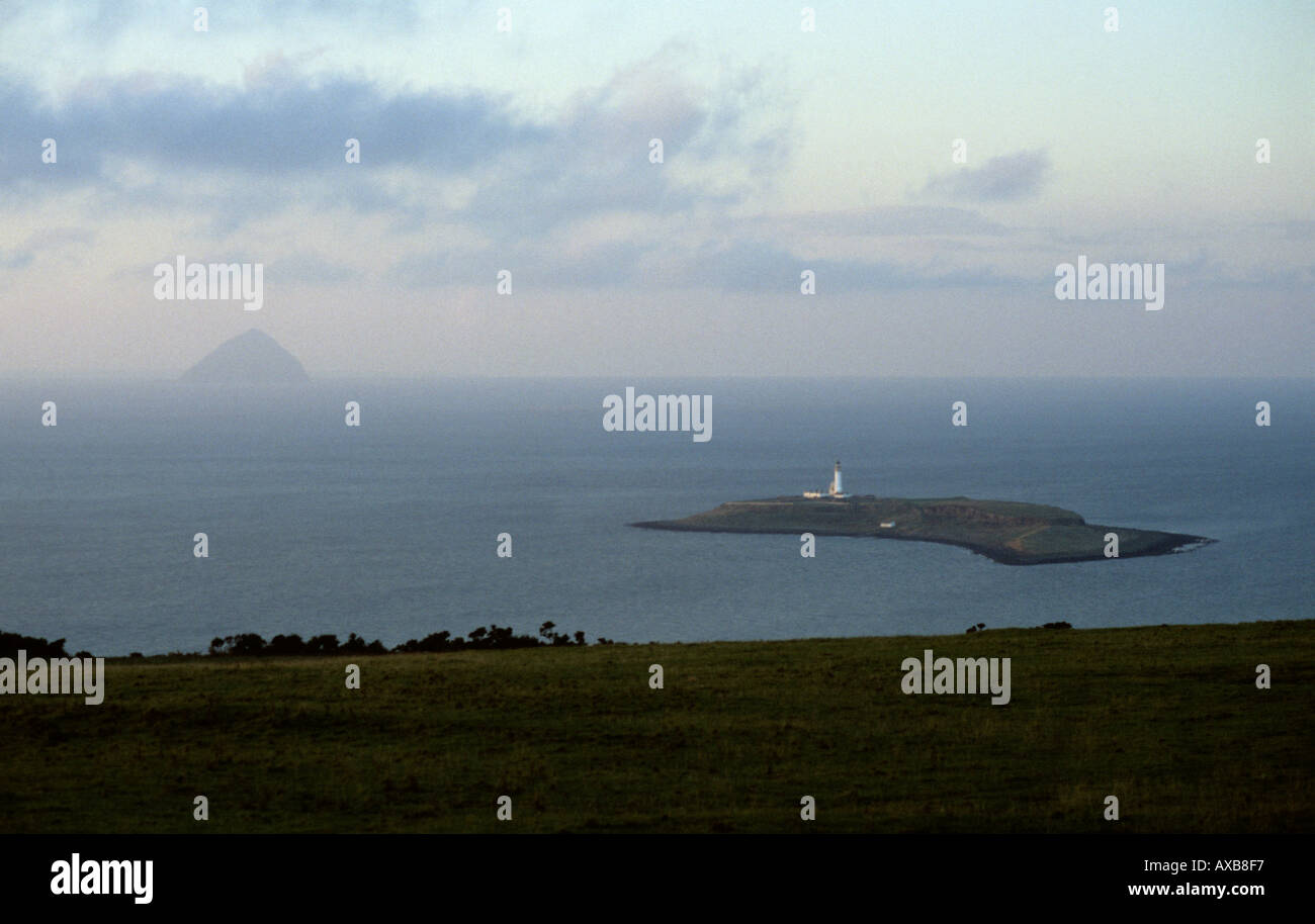 Pladda Island lighthouse from the Isle of Arran Ailsa Craig Stock Photo