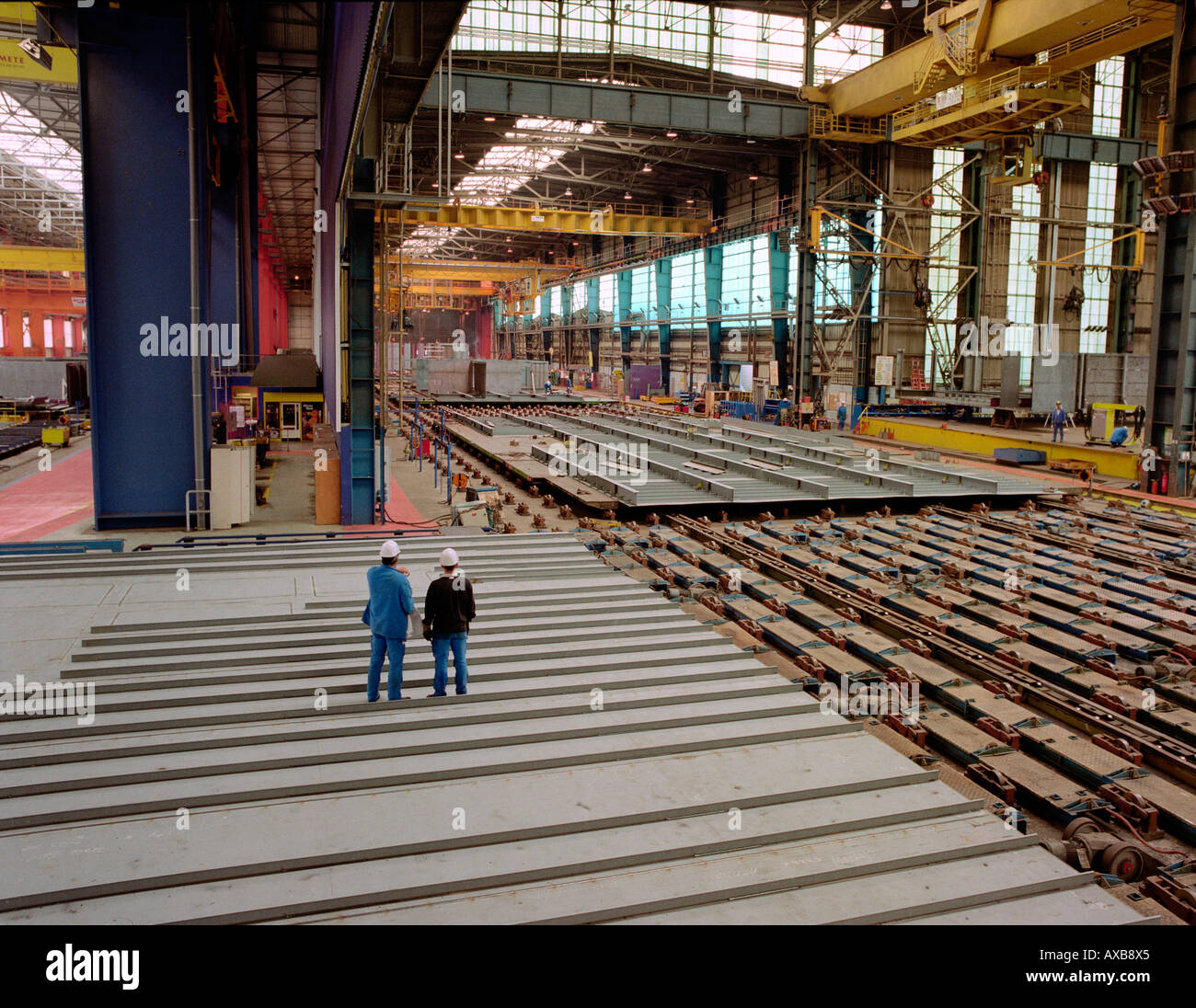 Huge factory floor, dry dock, Queen Mary 2, SaintNazaire, France Stock