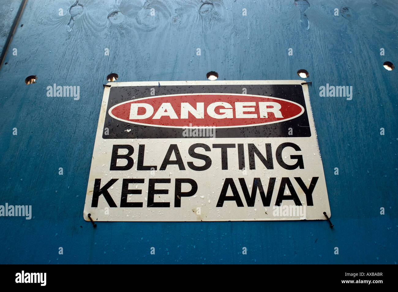 blasting sign at construction site Stock Photo