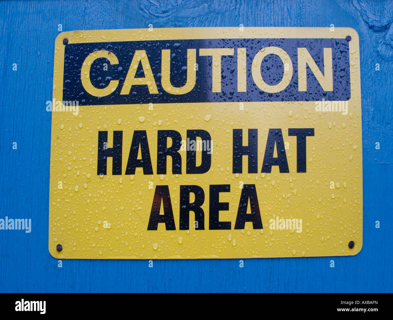 hard hat sign at construction site Stock Photo