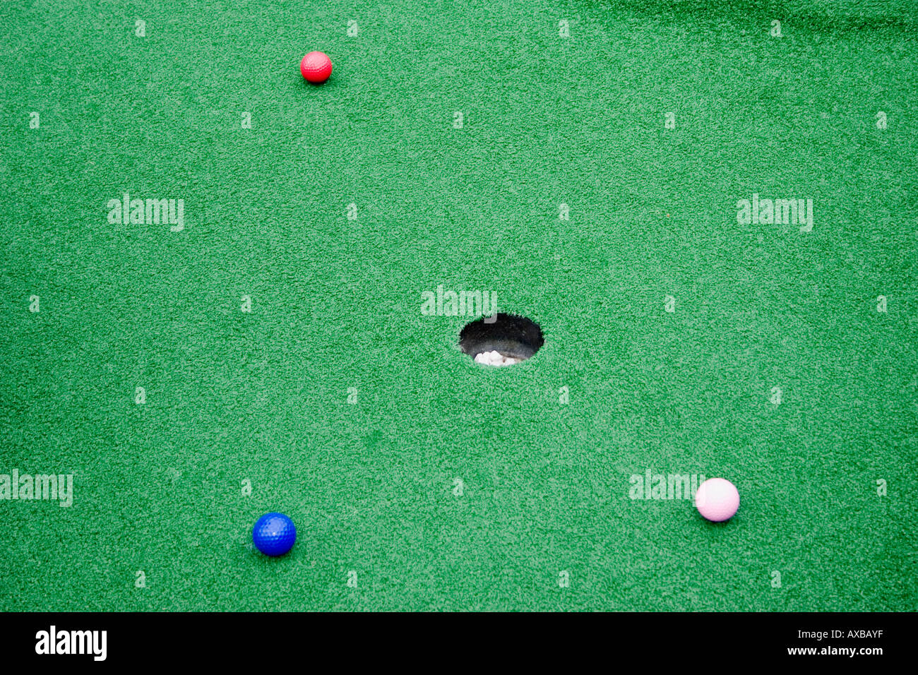 golf balls on mini golf green Stock Photo