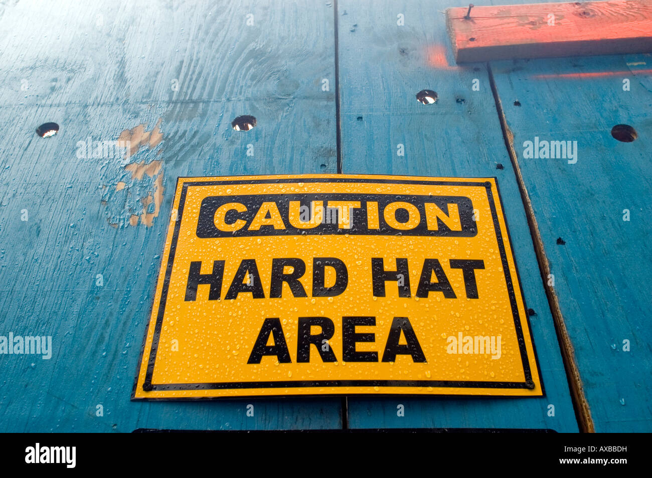 hard hat sign at construction site Stock Photo
