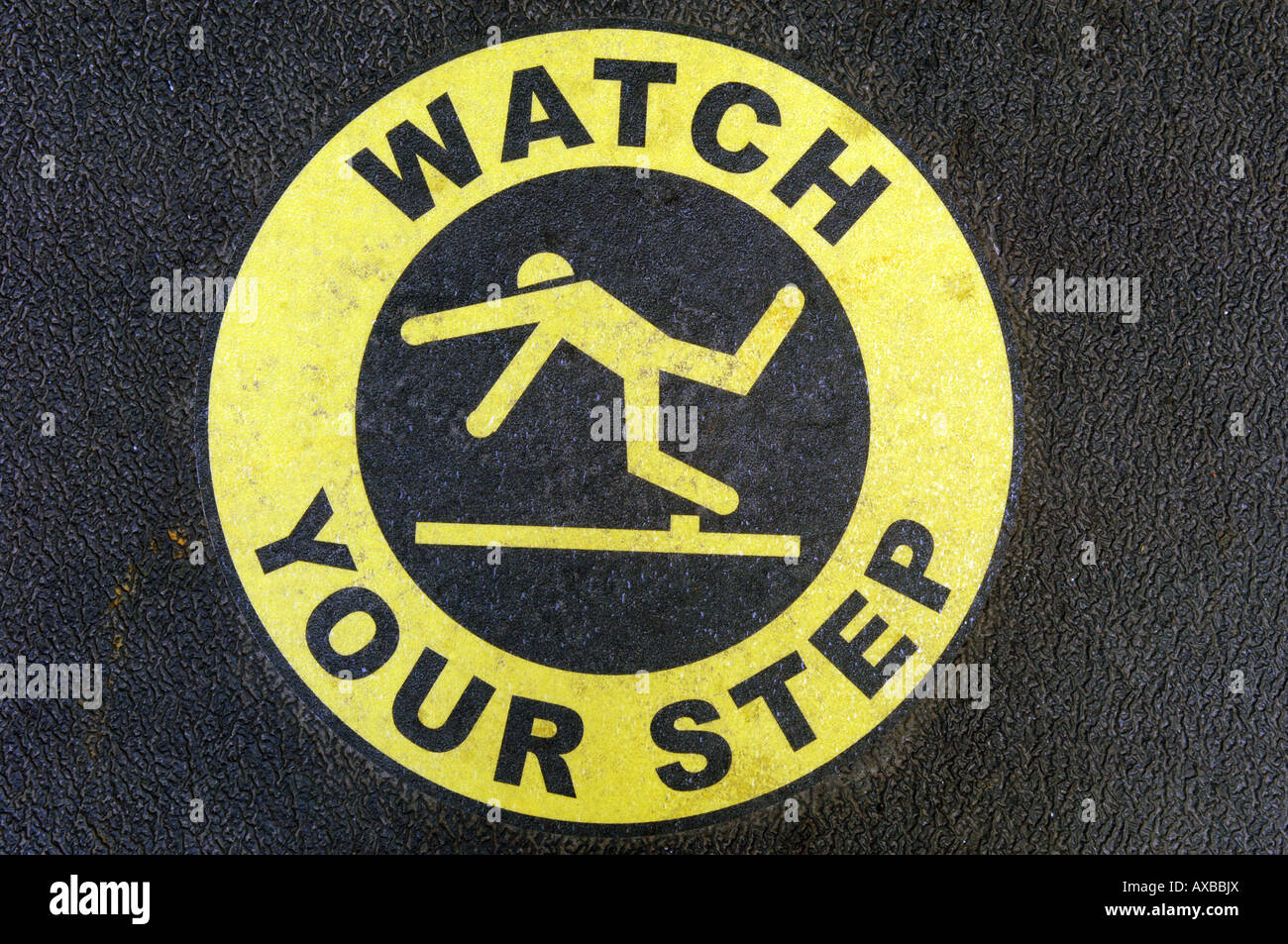 Watch your step sign at the entrance to a building Stock Photo