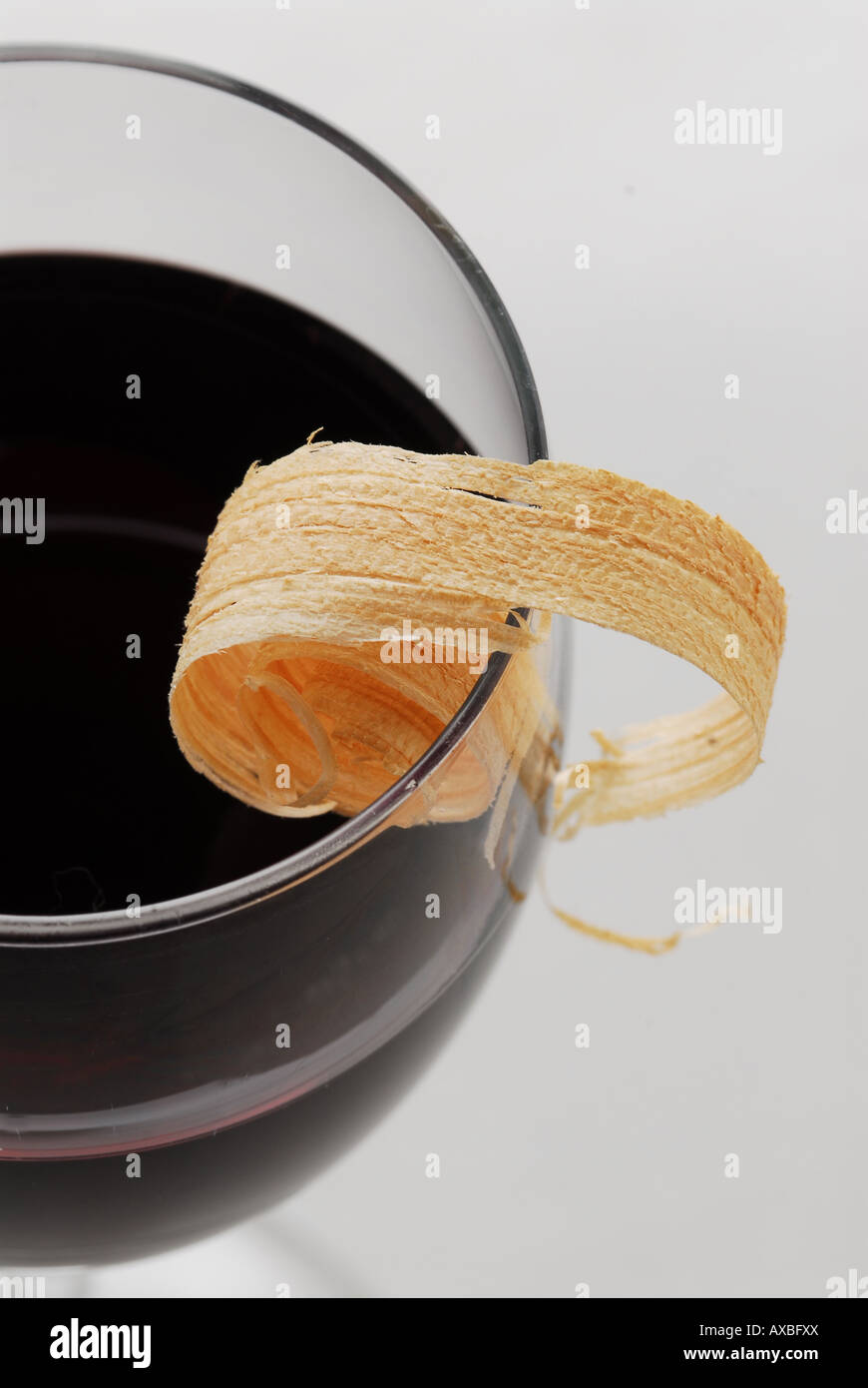Wood shaving and red wine Stock Photo