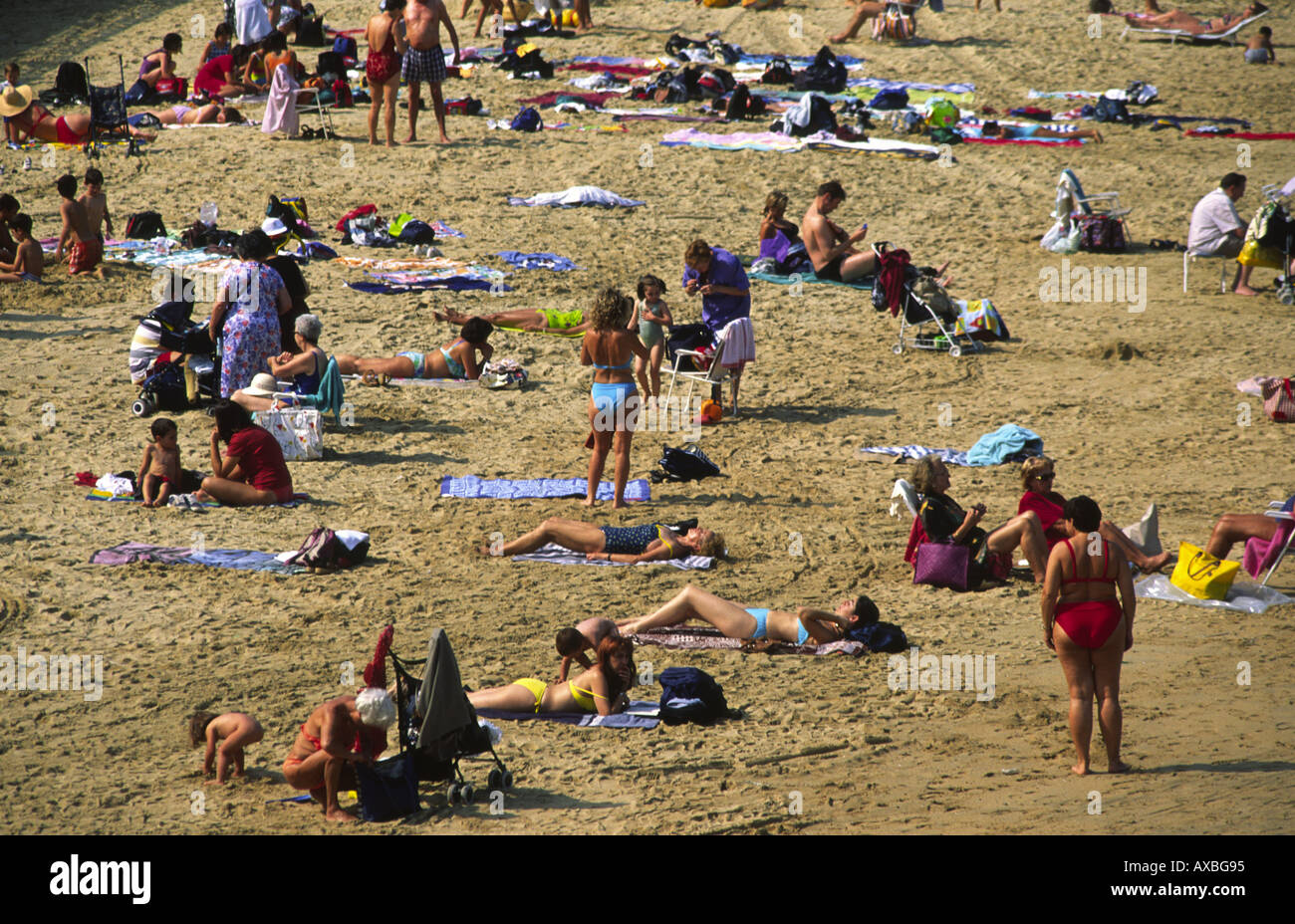 Crowded beach scene swimmers city hi-res stock photography and images ...