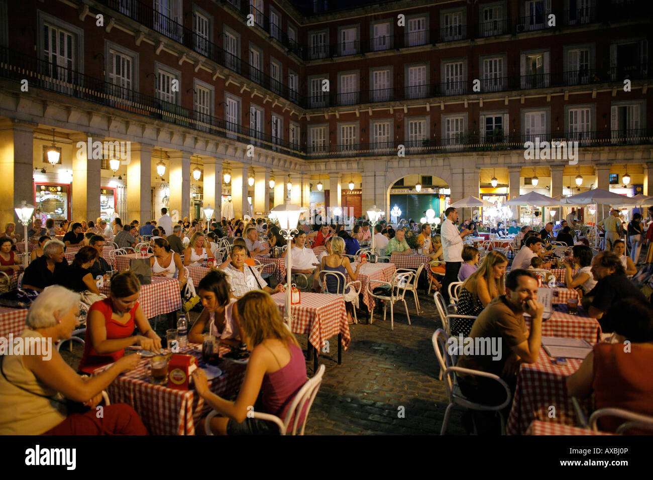 People sitting in restaurant at night, Plaza Mayor, Madrid, Spain Stock Photo Alamy