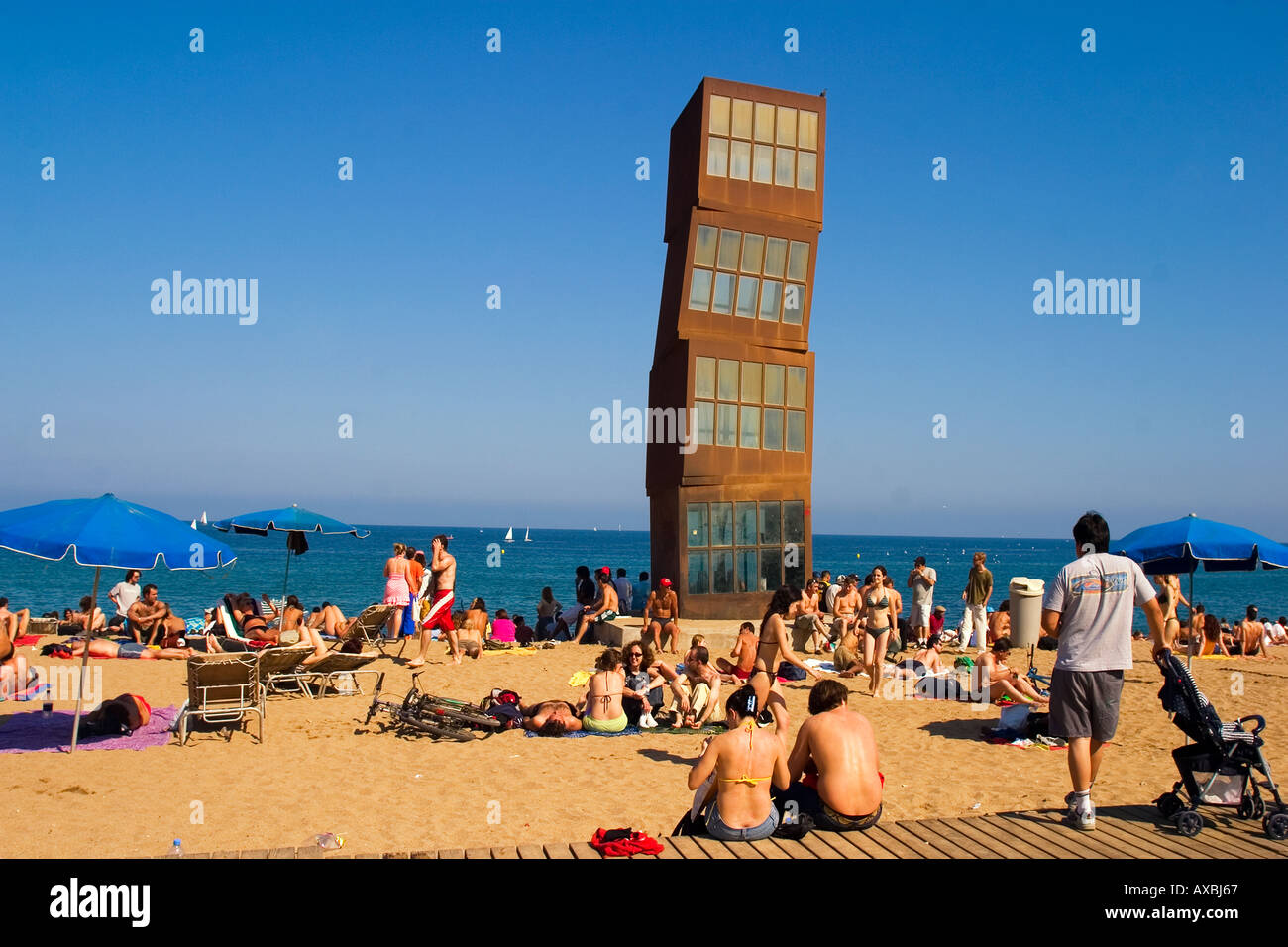 Spain Barcelona beach Platja de la Barceloneta people Sculture by Rebecca Horn Stock Photo