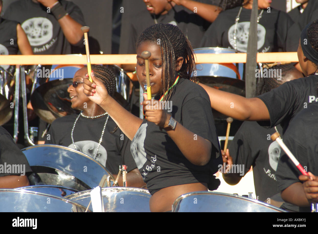 calypso steel band float drummers arms raised notting hill carnival