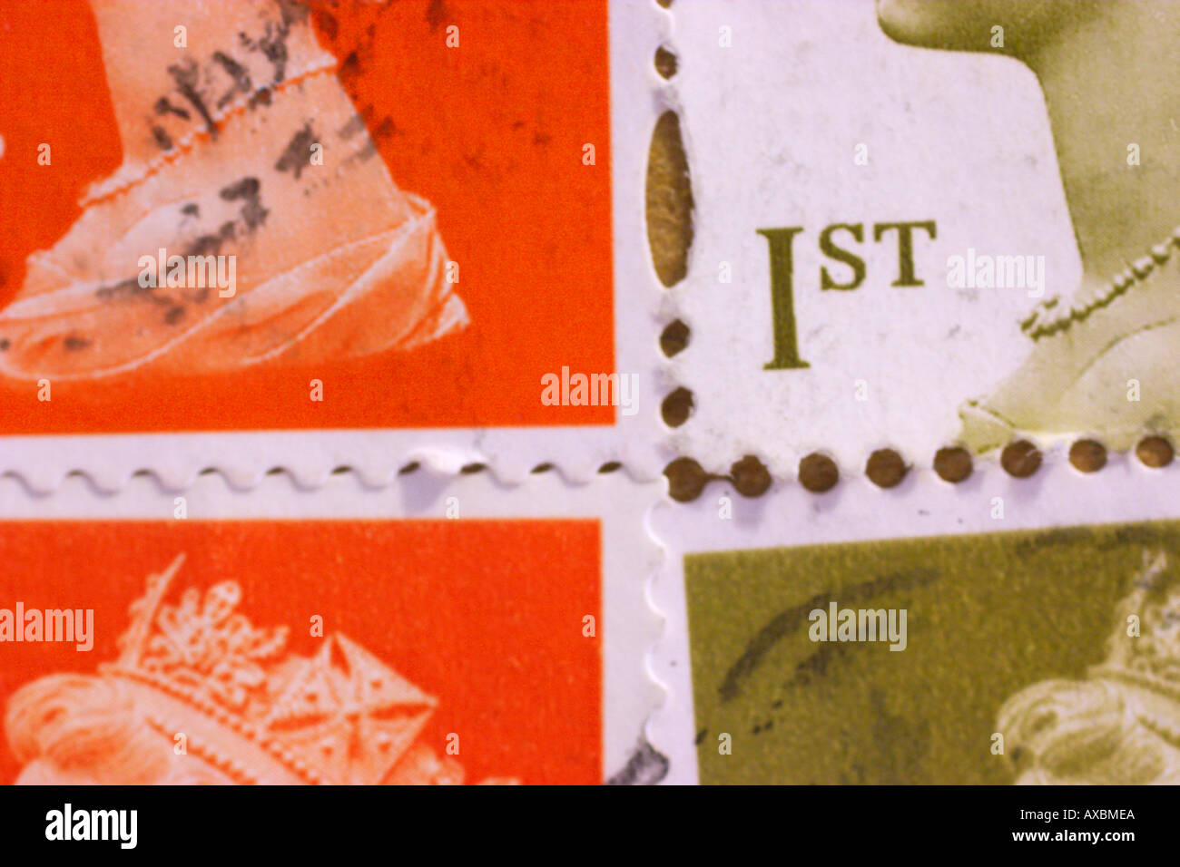 Closeup of a set of used 1st class stamps Stock Photo