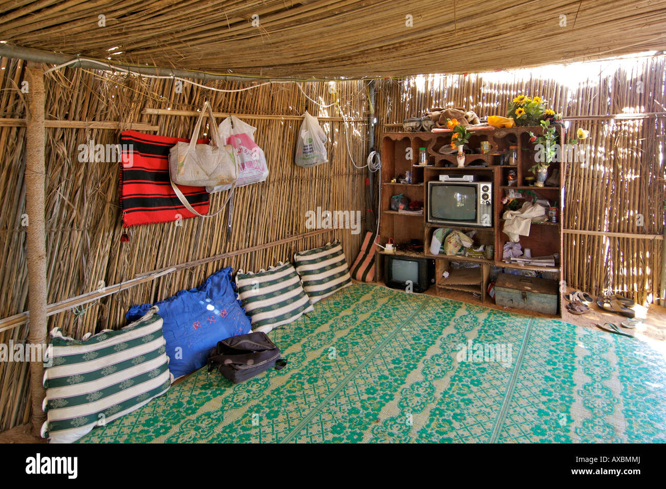 Interior of the communal room in a bedouin home in Wahiba Sands (Ramlat al Wahaybah) in Oman. Stock Photo