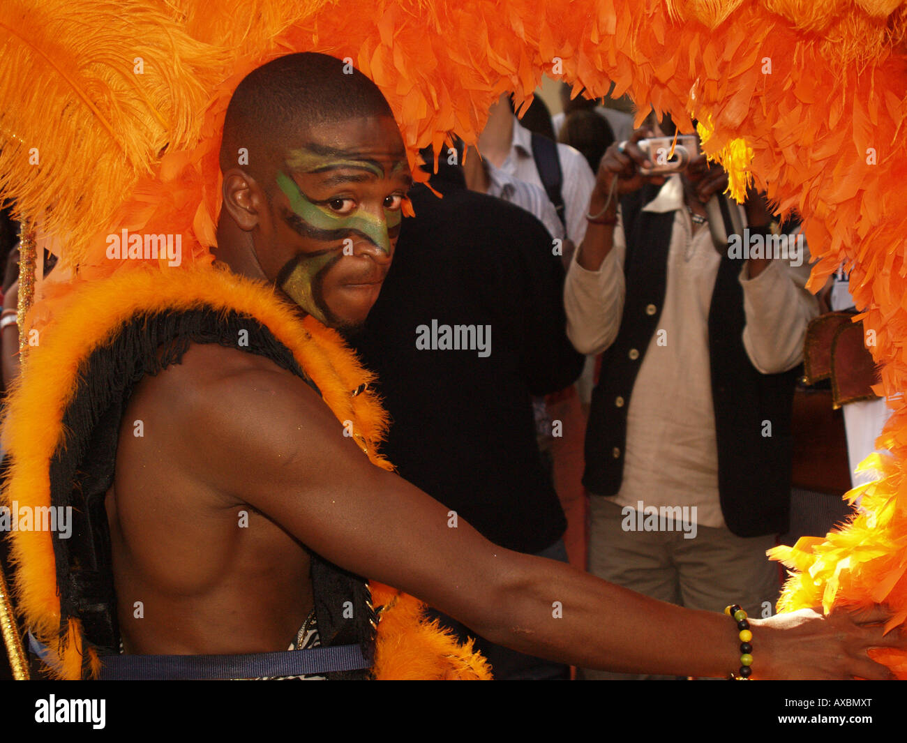 male calypso dancer costume orange looking twirl notting hill carnival