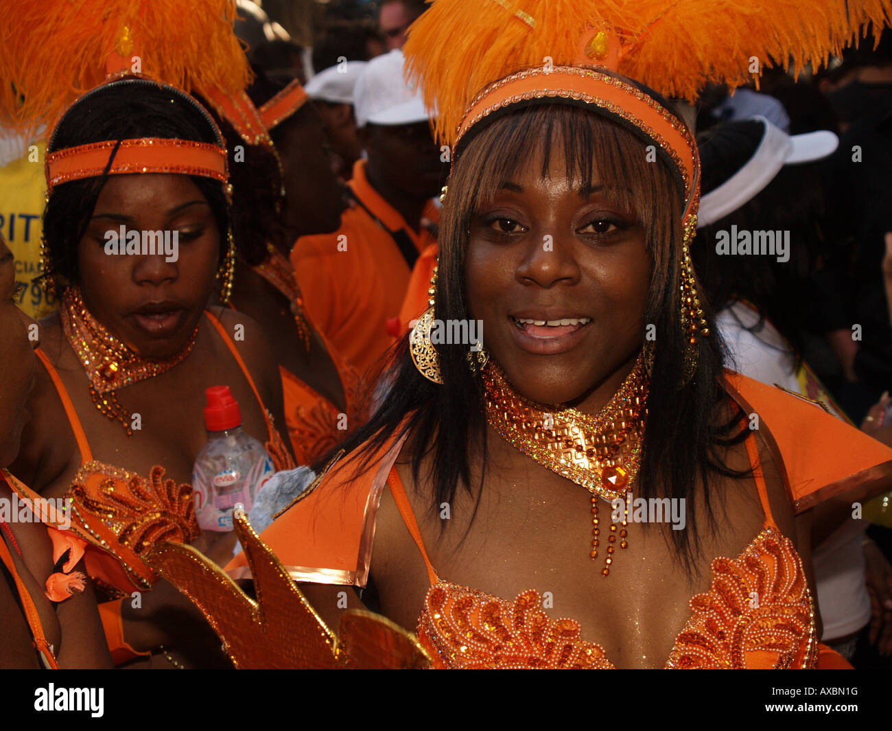 female calypso dancer hat costume orange looking notting hill carnival