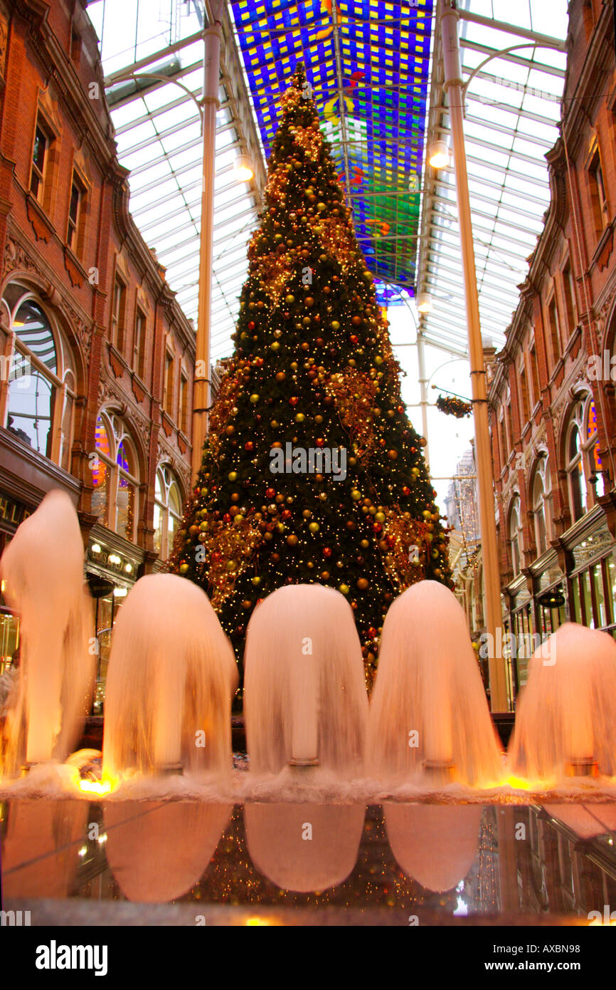 Christmas tree in shopping mall with fountains Leeds UK Stock Photo Alamy