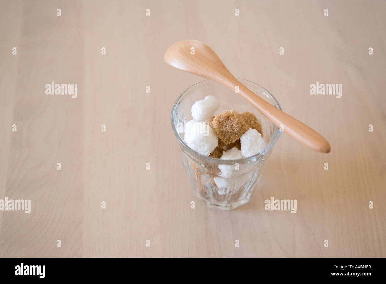 Sugar cubes in glass Stock Photo Alamy