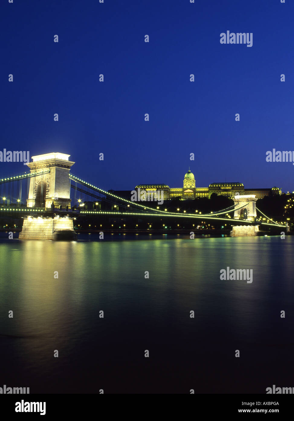 Szechenyi Chain Bridge Danube River Castle Hill Royal Palace Night time illumination Budapest Hungary Stock Photo