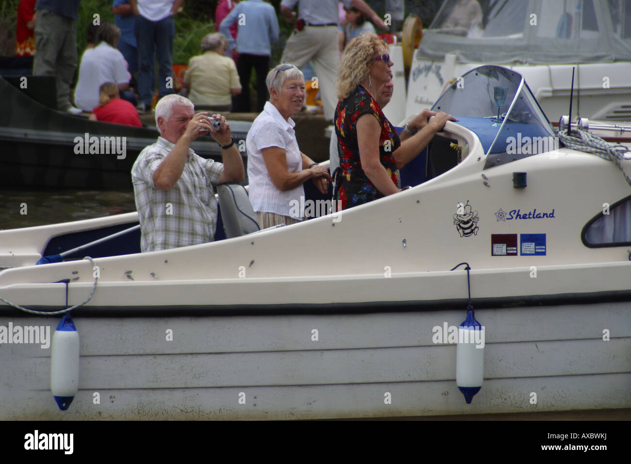 cruiser large speedboat dinghy boating sailors river medway maidstone kent england Stock Photo