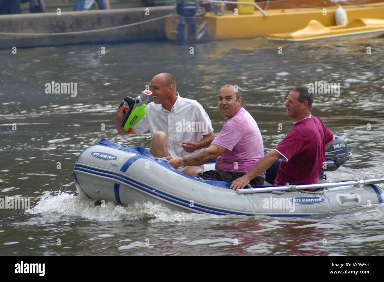 3 men in a boat dinghy racing river river medway maidstone kent england