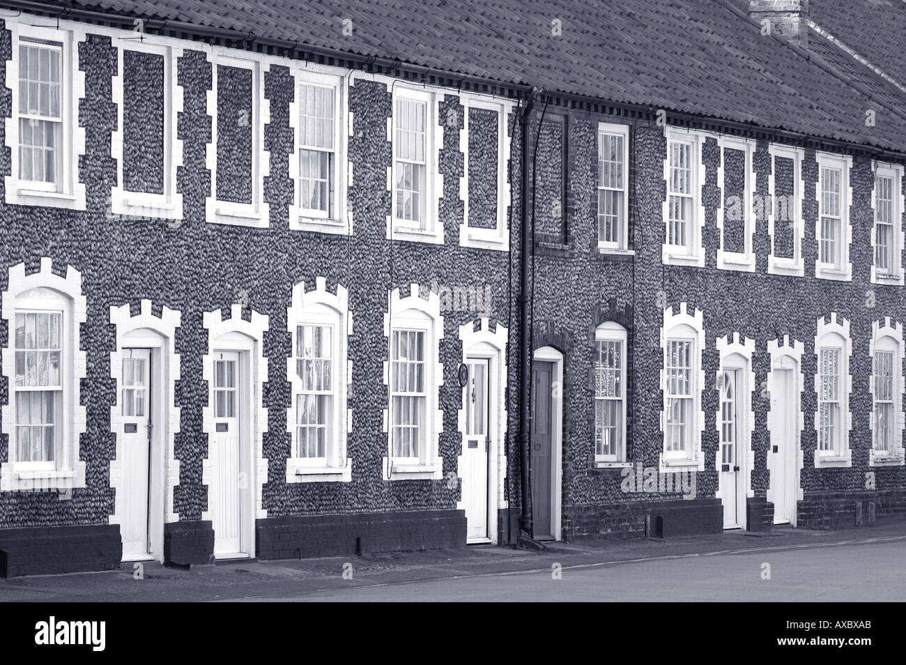 Terraced flint faced cottages in Holt Norfolk Stock Photo Alamy