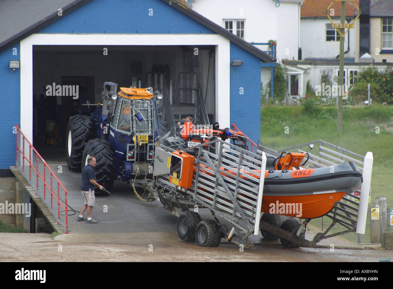 tractor boathouse rescue boat trailor reversing rye kent england Stock Photo