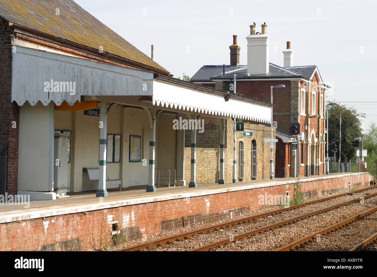 railway station platform door canopy rail track appledore kent england Stock Photo