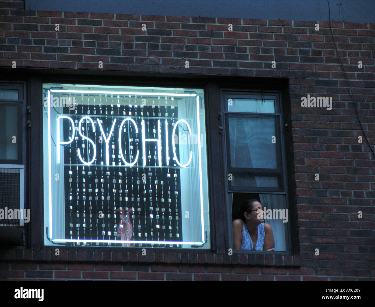 Psych Front Window Woman looking out of window of Psychic's place, USA, Manhattan, New ...