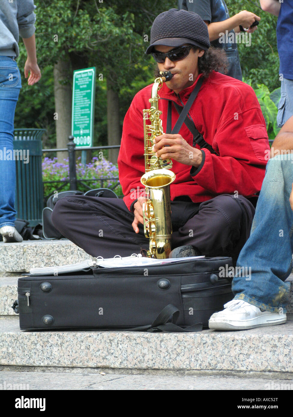 Saxophon player with sunglasses and hat at Union Square, USA, Manhattan, New York Stock Photo