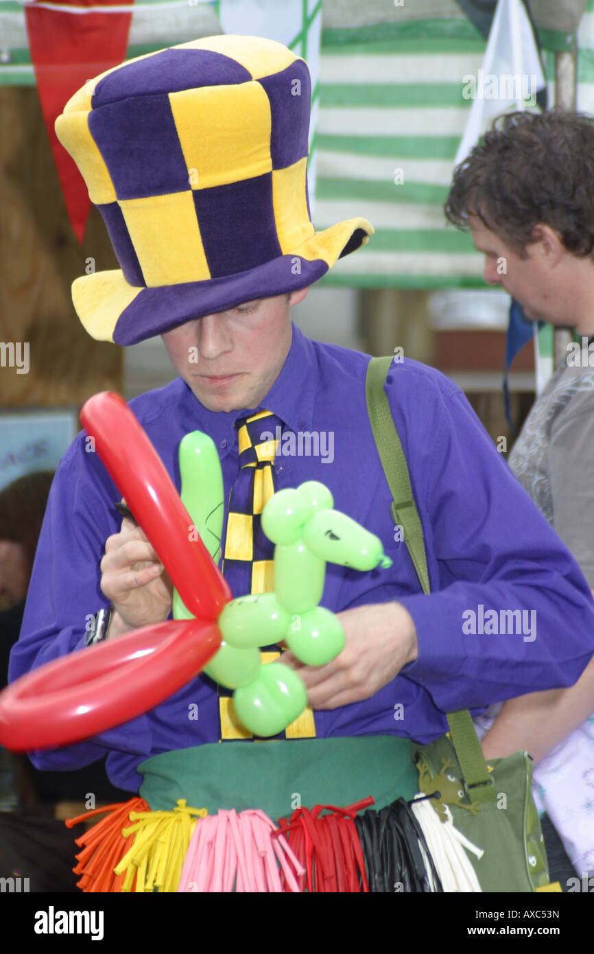 comedy clown giant bubble blower balloon creator Stock Photo