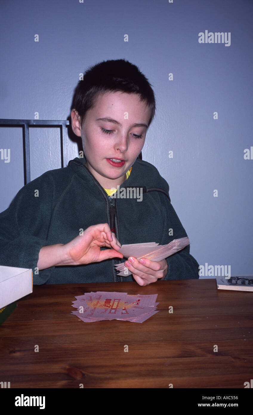 Boy playing Scoop board game London, England UK Stock Photo Alamy