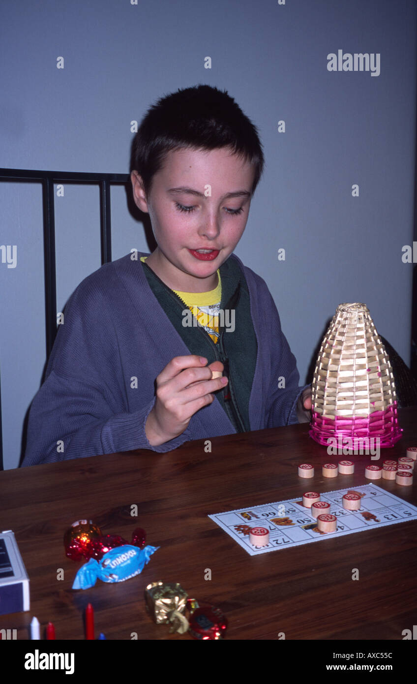 Boy playing bingo board game London, England UK Stock Photo Alamy