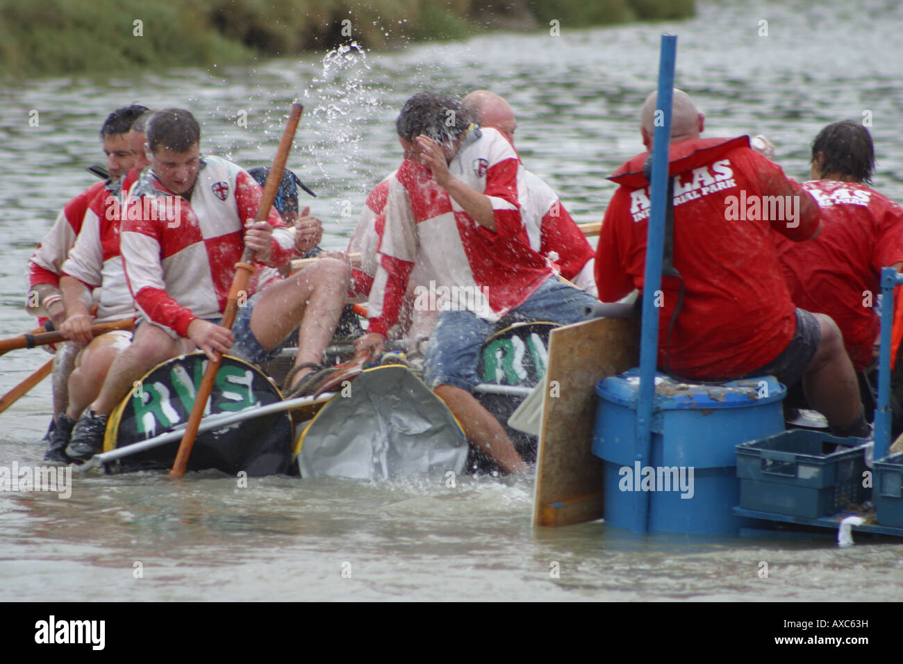 raft race competitors rowing river paddles chaos Stock Photo - Alamy