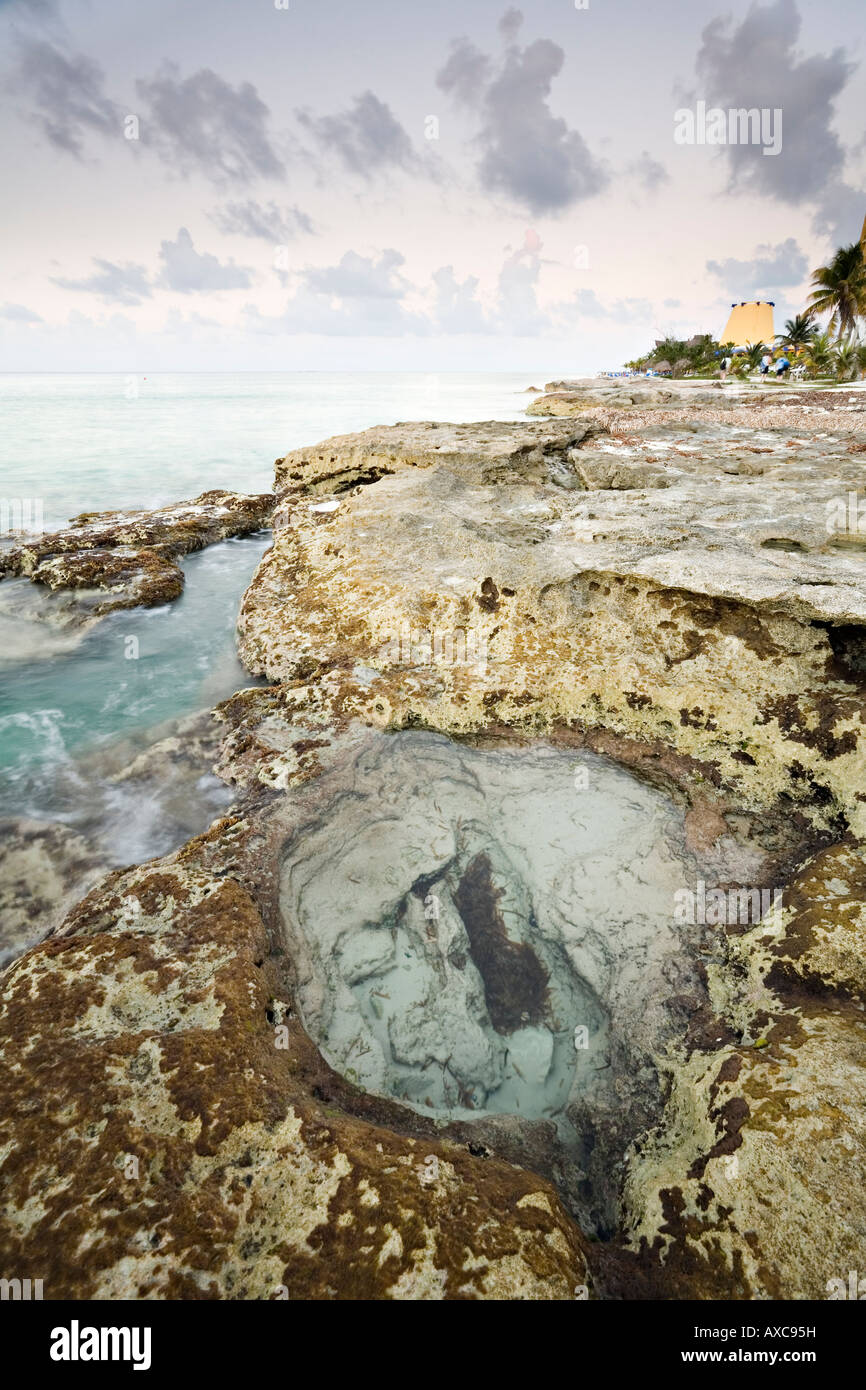 Pool of water on the beach at Isla de Cozumel, Mexico Stock Photo
