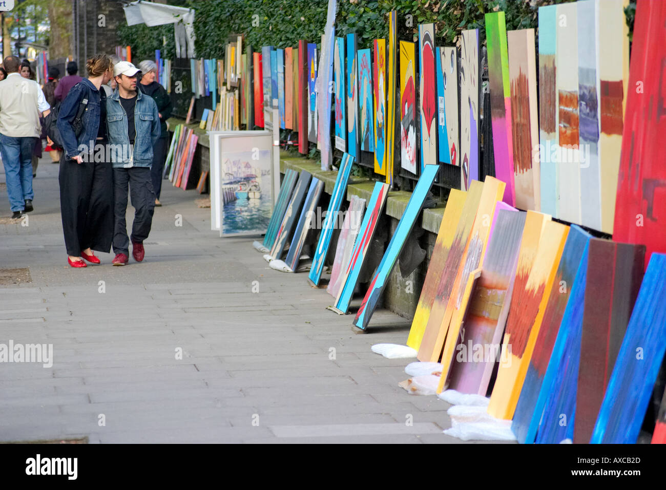 Art artists paintings pictures on Bayswater Road Exhibition Road Rd in London England Britain UK united kingdom Stock Photo