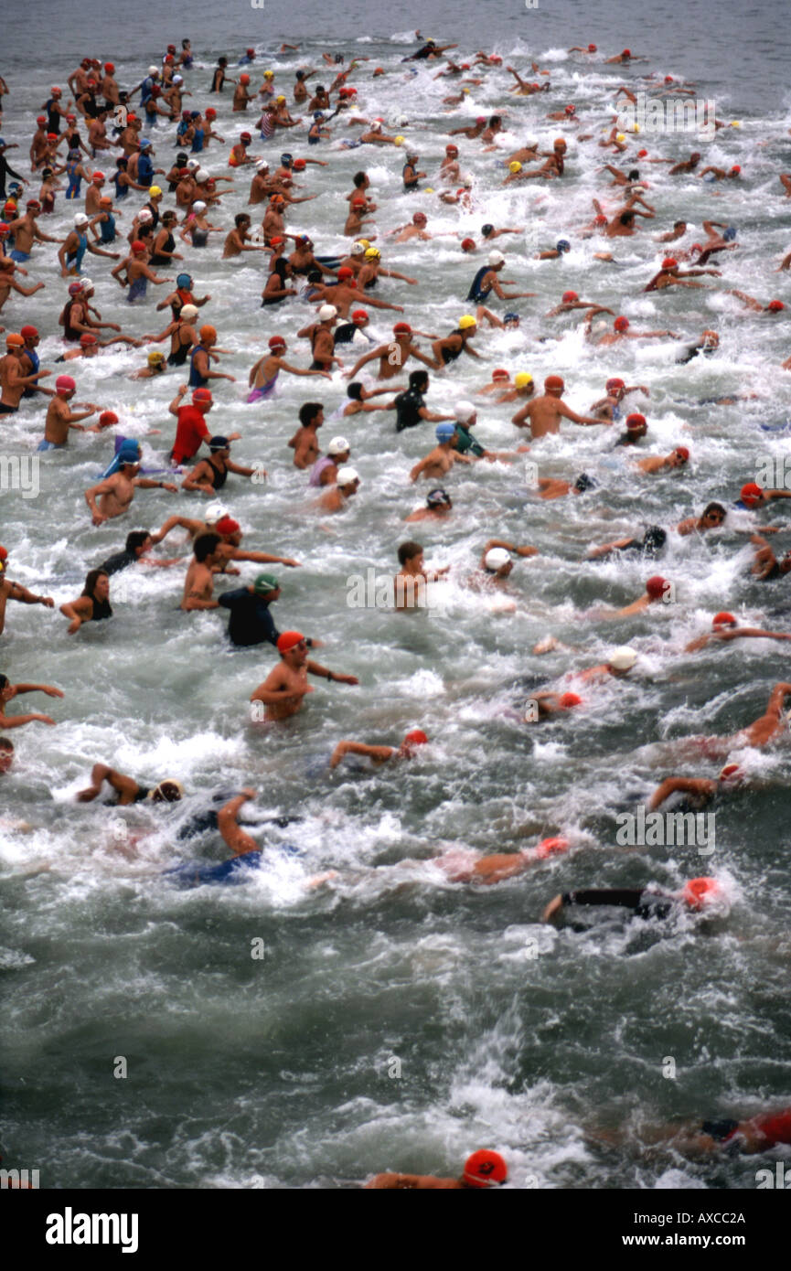 Swimmers competing in ocean race Stock Photo - Alamy