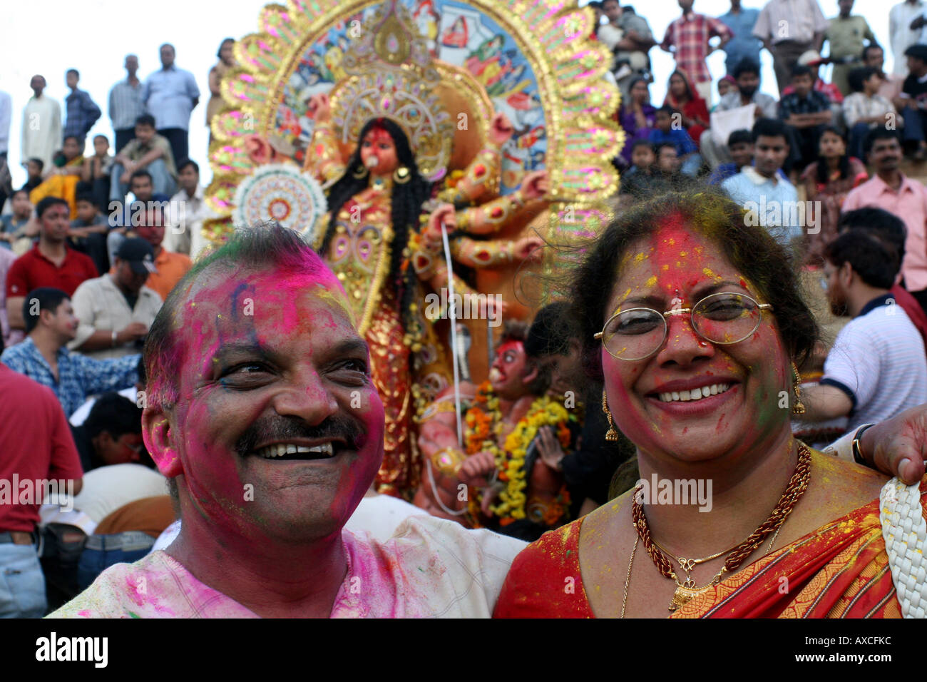 Sindur covered Man and Woman at Dusshera Celebrations, Bangalore Stock Photo