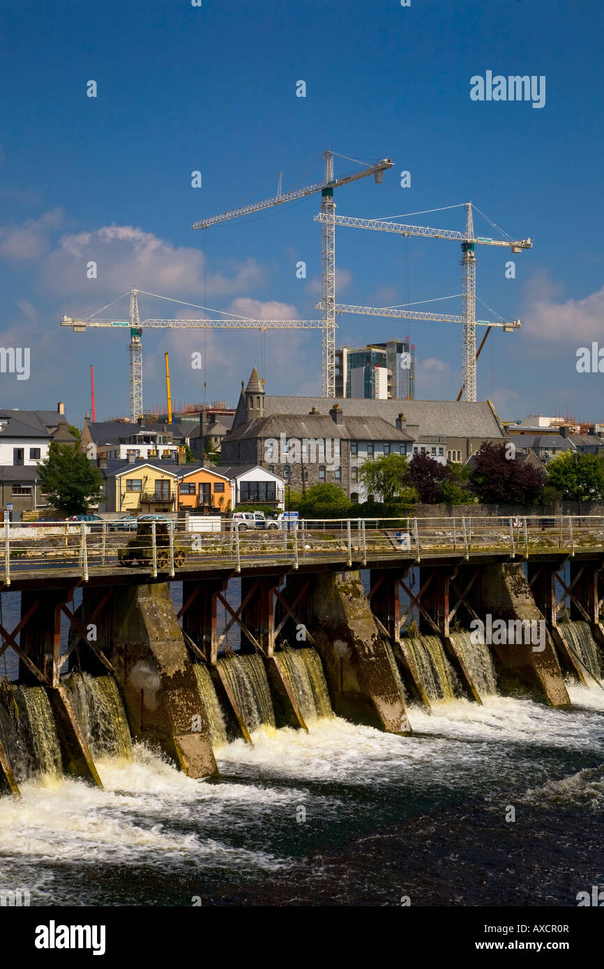 Salmon Leap Weir, and distant construction cranes, Athlone city