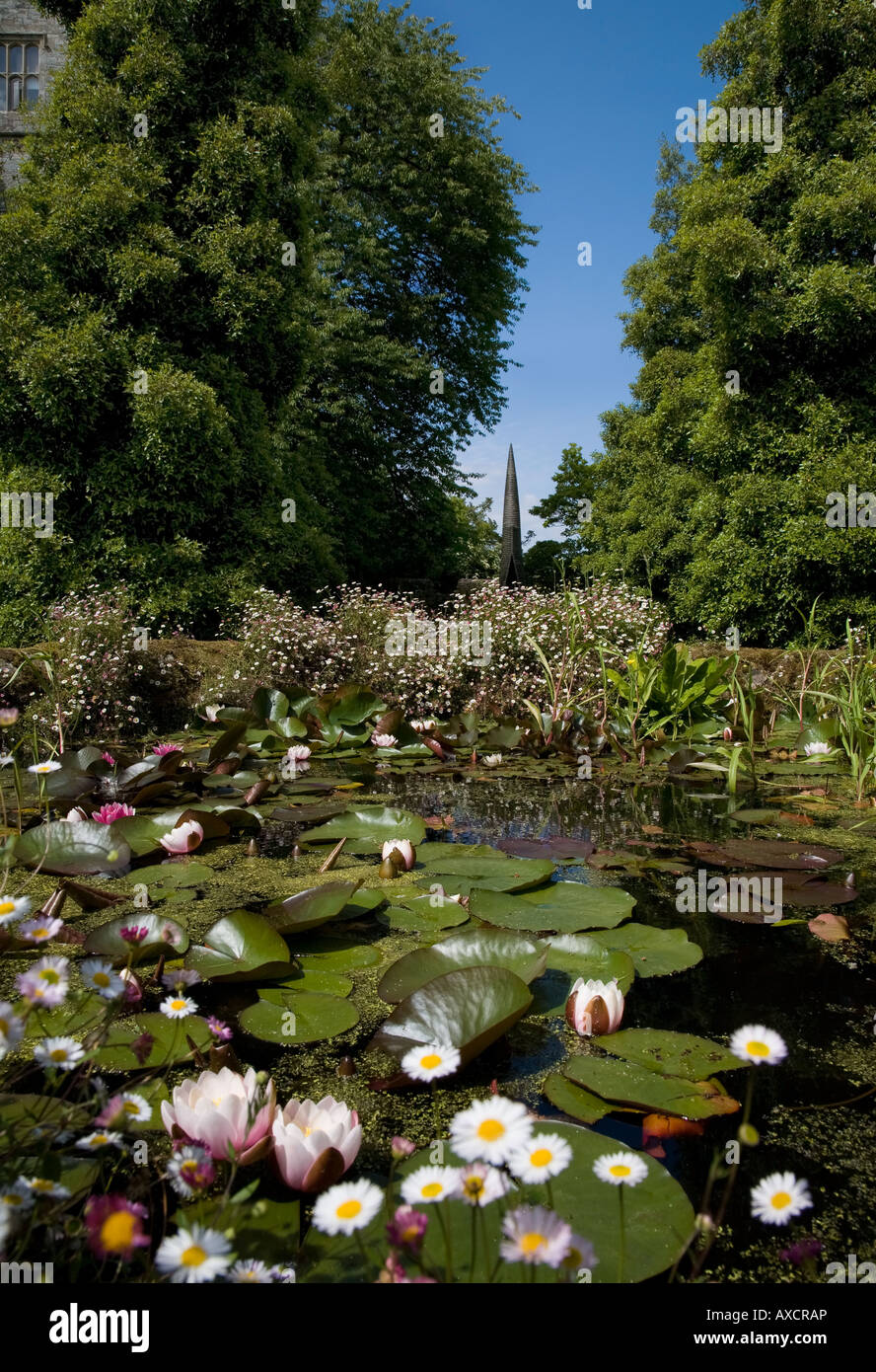 Lily pond and distant contemporary obelisk sculpture in the Lower
