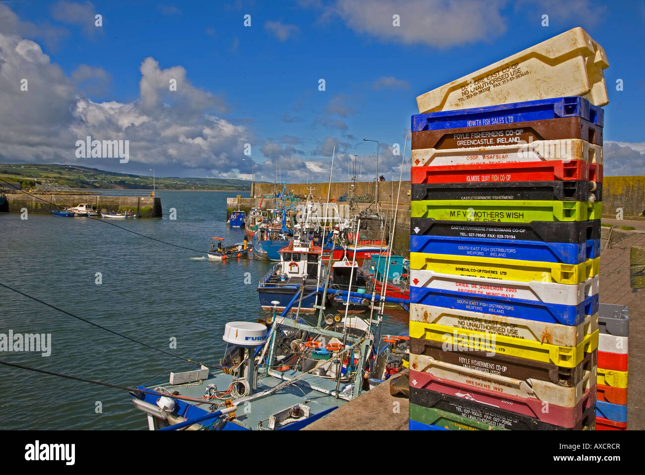 Stacked Fish Boxes and Fishing Boats in Helvick Harbour, Ring Gaelic Speaking Area, County