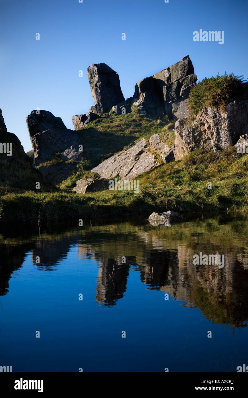 Rocks and small pool above Trawnamoe Beach, Near Bunmahon, The Copper Coast, County Waterford, Ireland Stock Photo