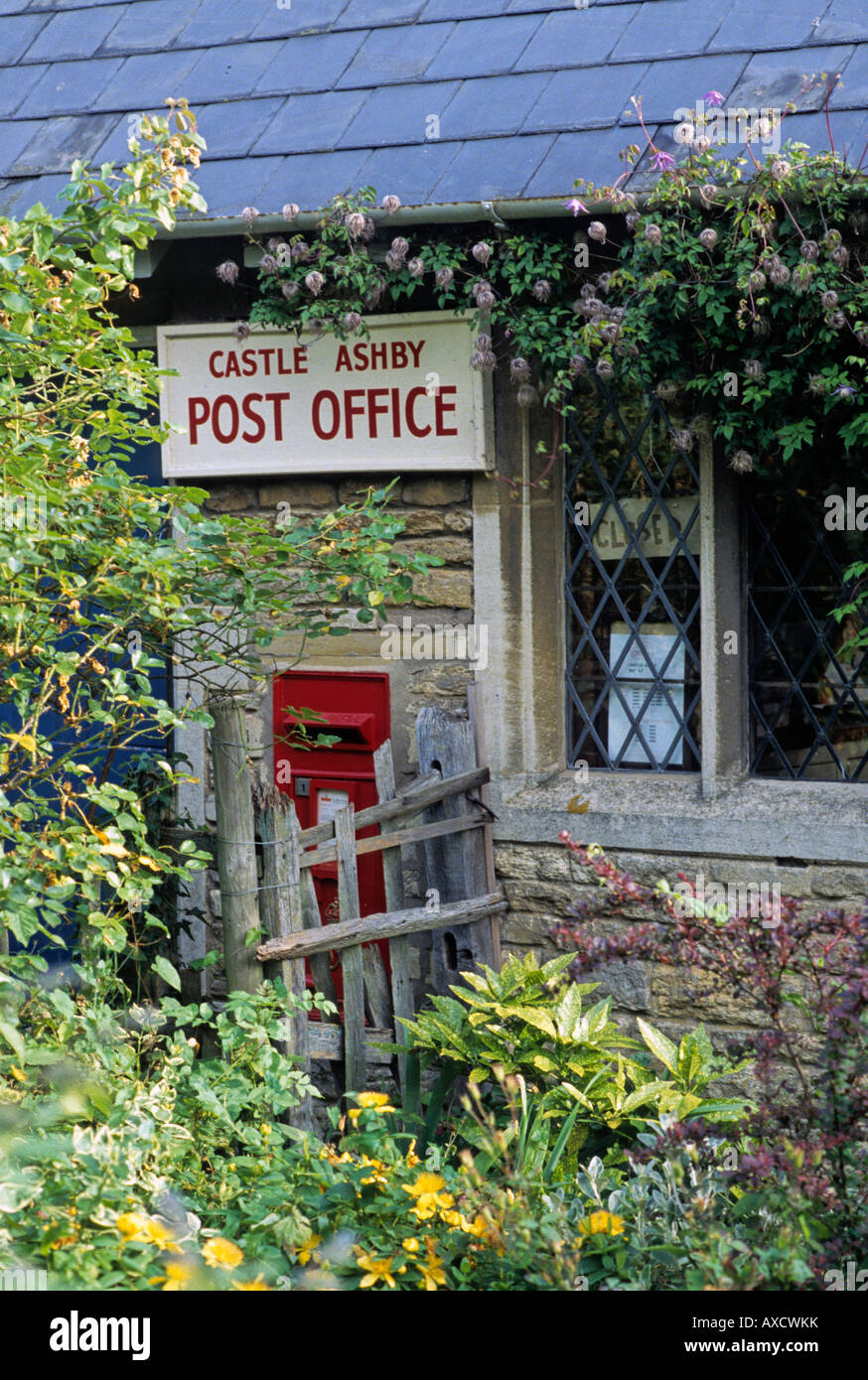 Castle Ashby post office with its red letter box, Northamptonshire
