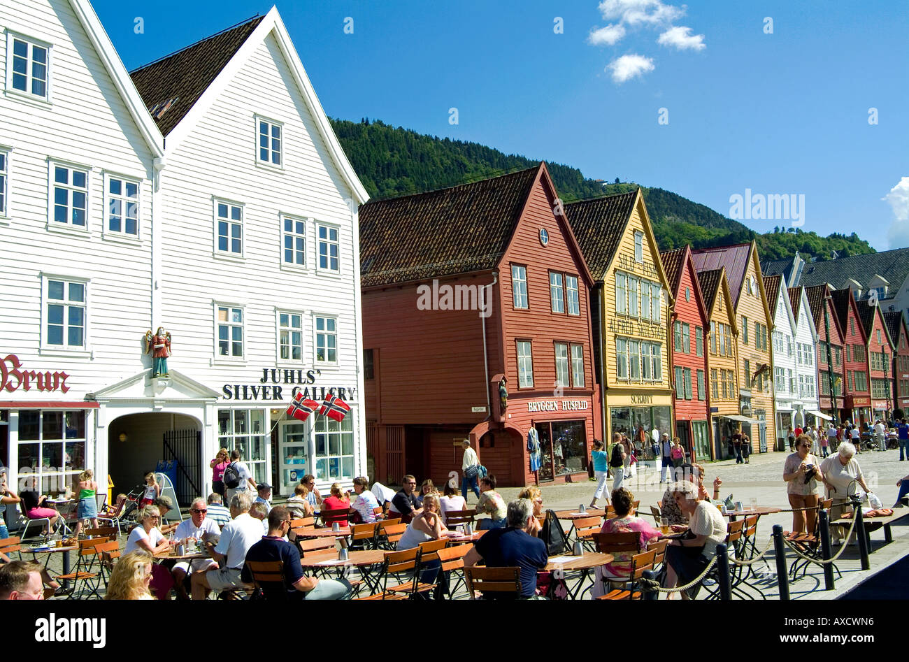 People relaxing at Bryggen waterfront.Bergen.Norway Stock Photo
