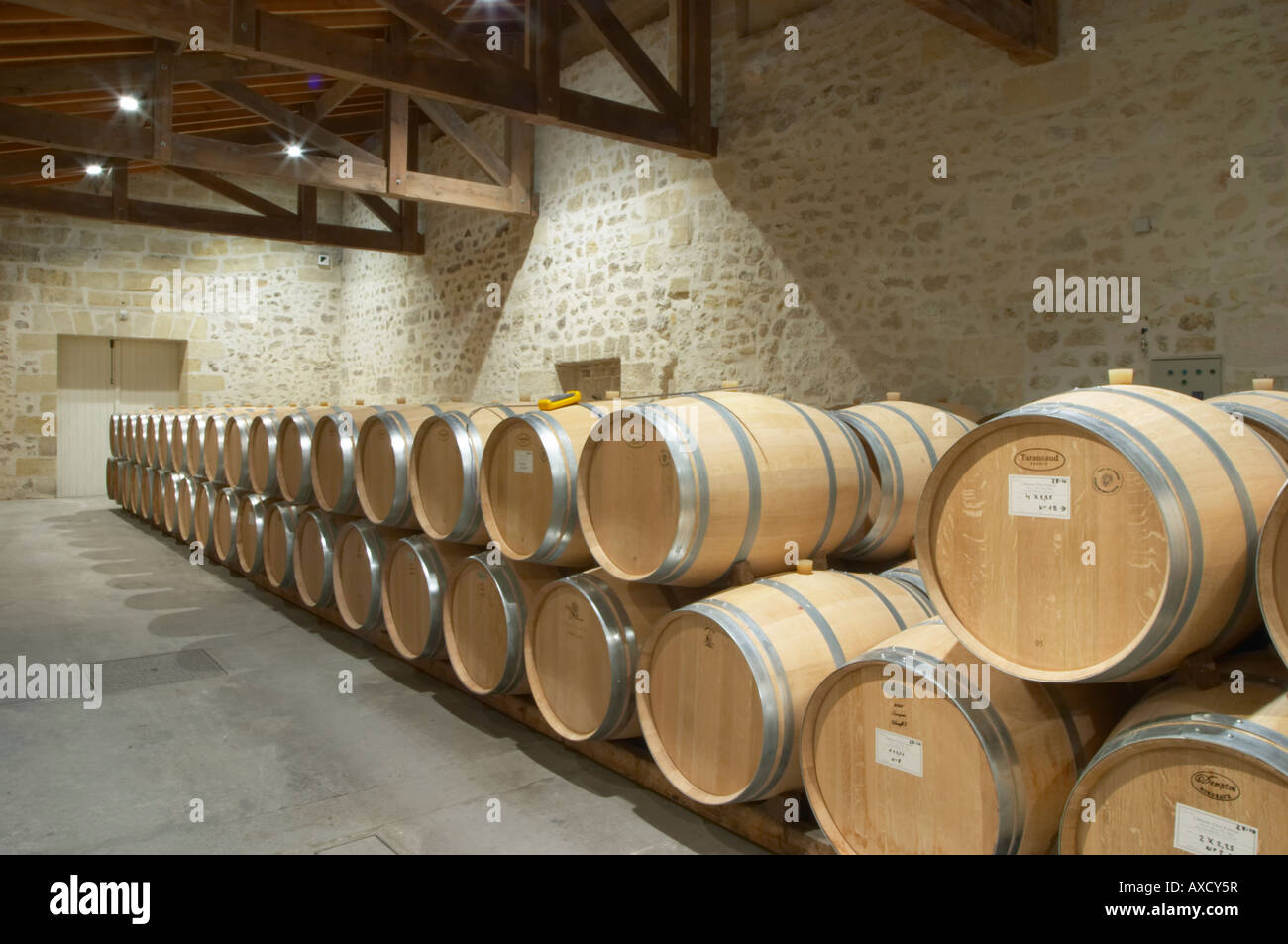 Oak barrel aging and fermentation cellar. Chateau Clos Fourtet, Saint