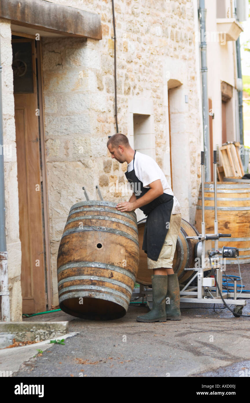 Oak barrel aging and fermentation cellar. Cleaning old barrels. The village. Pommard, Cote de