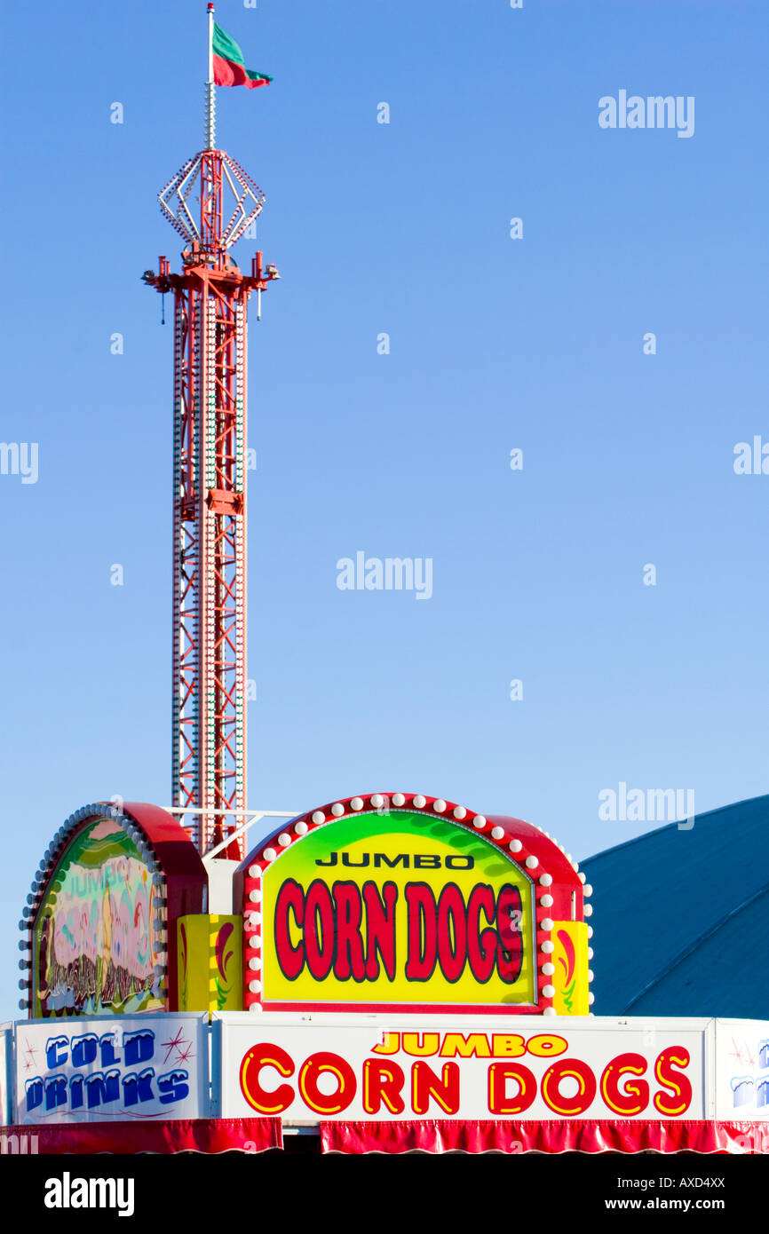 Jumbo corn dog sign and ride at carnival in USA Stock Photo - Alamy