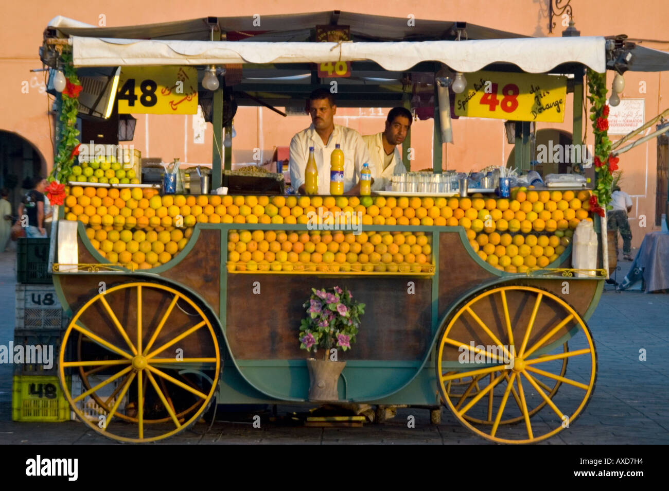 Horizontal close up of a traditional fresh orange juice stall in Place