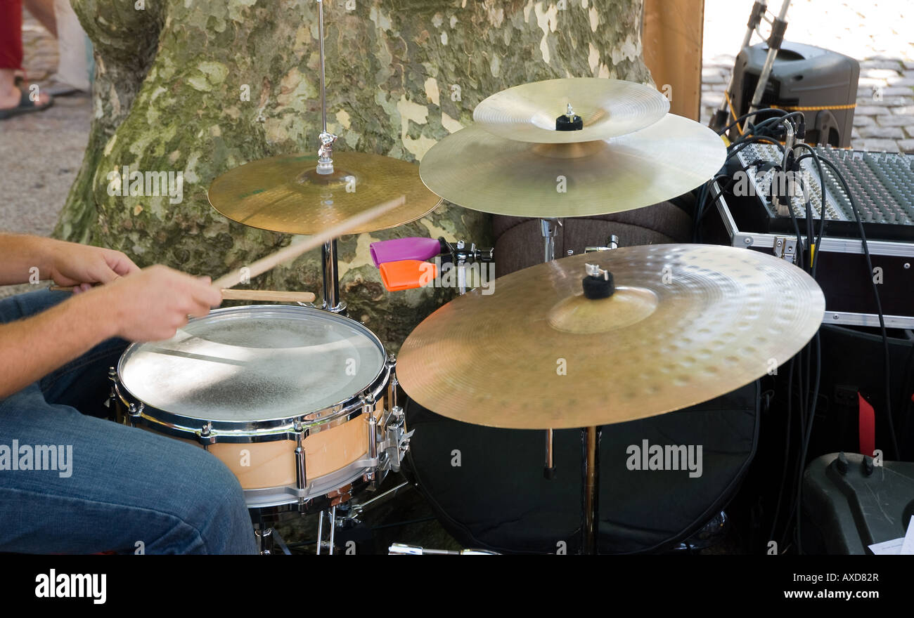 A drums player in the street Stock Photo