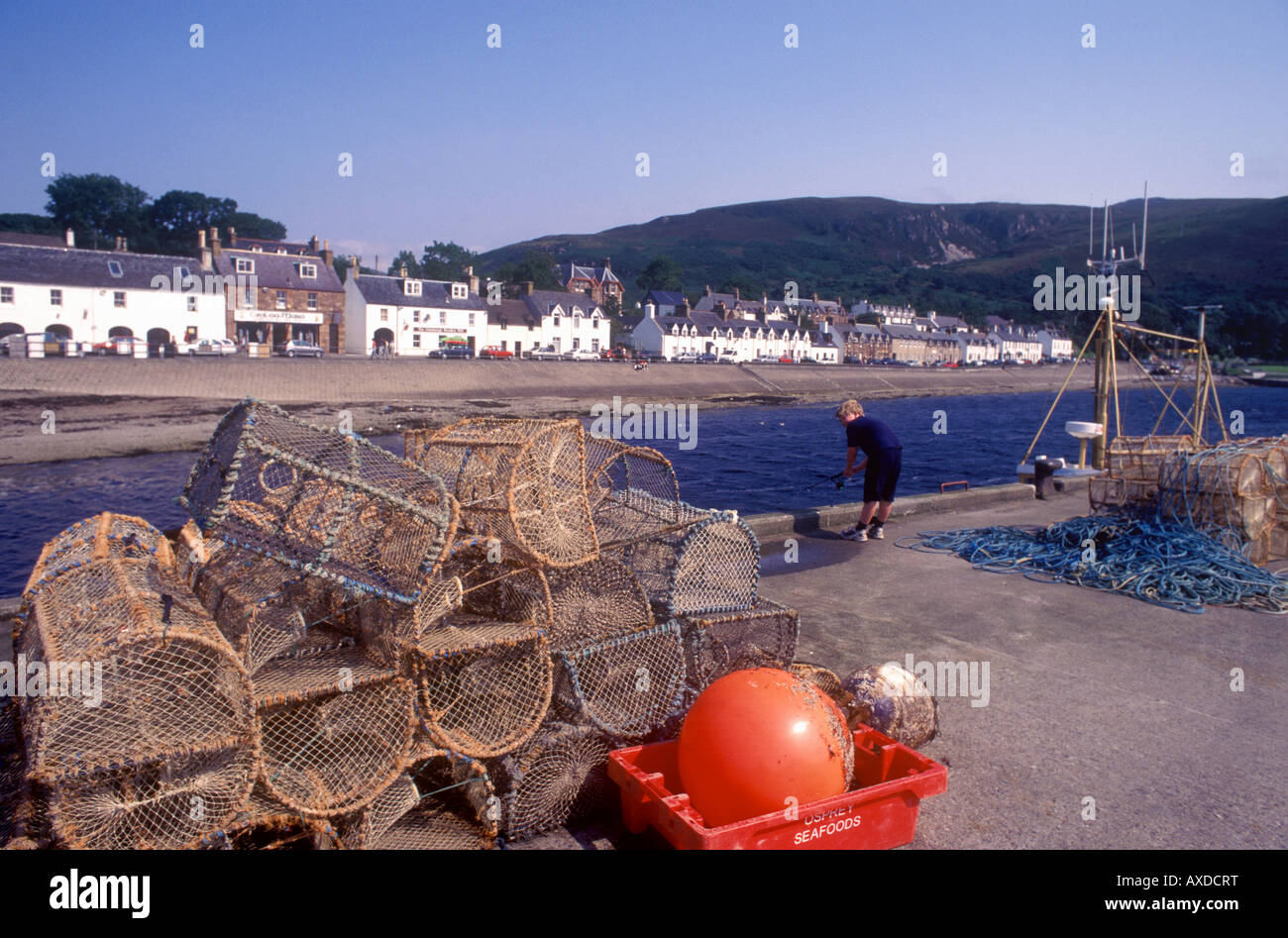 Ullapool Lobster pots on the quayside Stock Photo Alamy