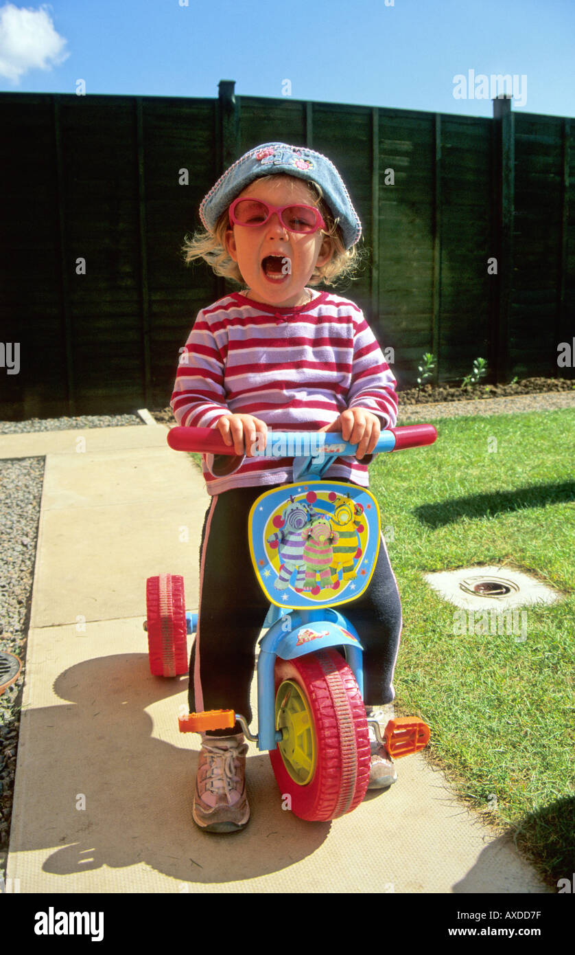 Child on tricycle Stock Photo Alamy