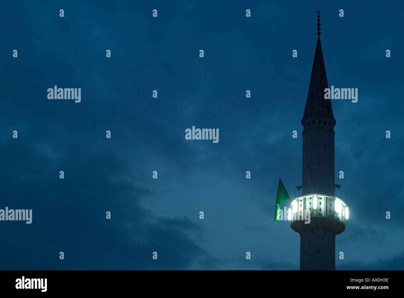 Minaret of a Mosque Silhouetted Against a Deep Blue Dusk Sky Banja Luka Bosnia Herzegovina Stock Photo